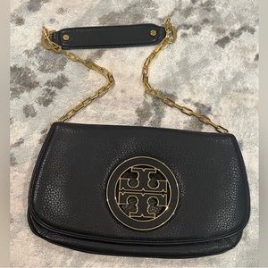 Tory Burch Classic Clutch - black leather and gold straps - very elegant…